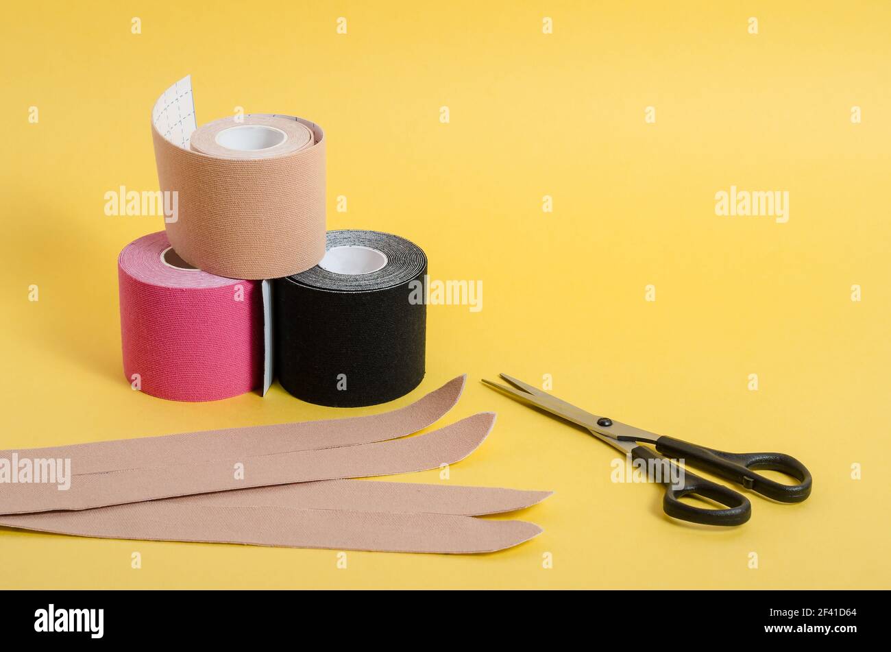 Kinesiological multicolored tapes for fixing muscles during sports and