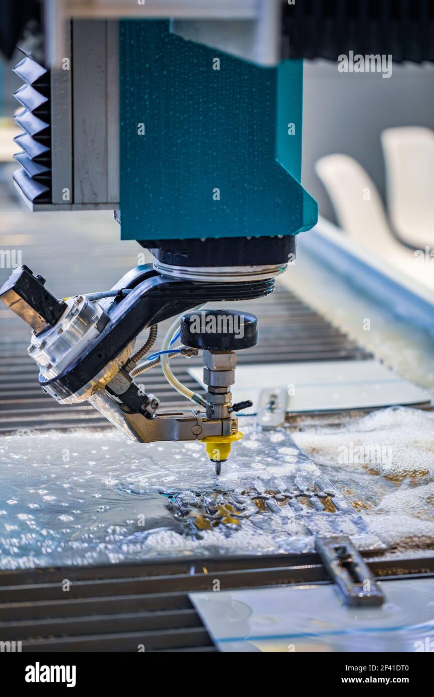CNC water jet cutting machine modern industrial technology Stock Photo
