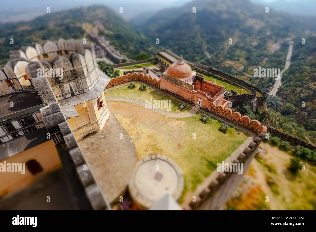 Tilt shift lens - Kumbhalgarh is a Mewar fortress on the westerly range of Aravalli Hills, in the Rajsamand district near Udaipur of Rajasthan state in western India. Stock Photo