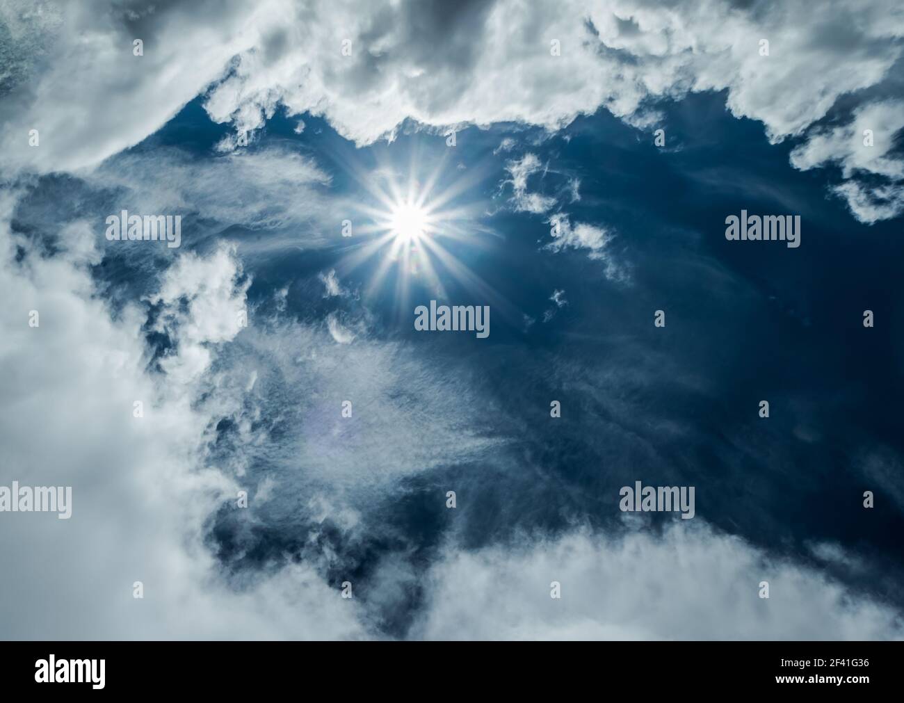 Sun in blue sky background Stock Photo