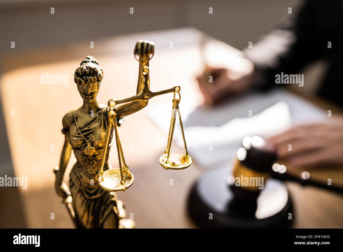 Judge With Gavel In Court Writing Legal Law Order Stock Photo
