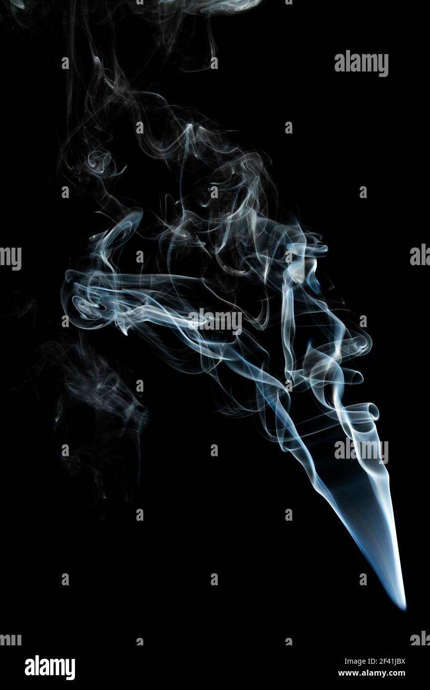 Grey smoke abstract texture, isolated effect with dark background Stock Photo