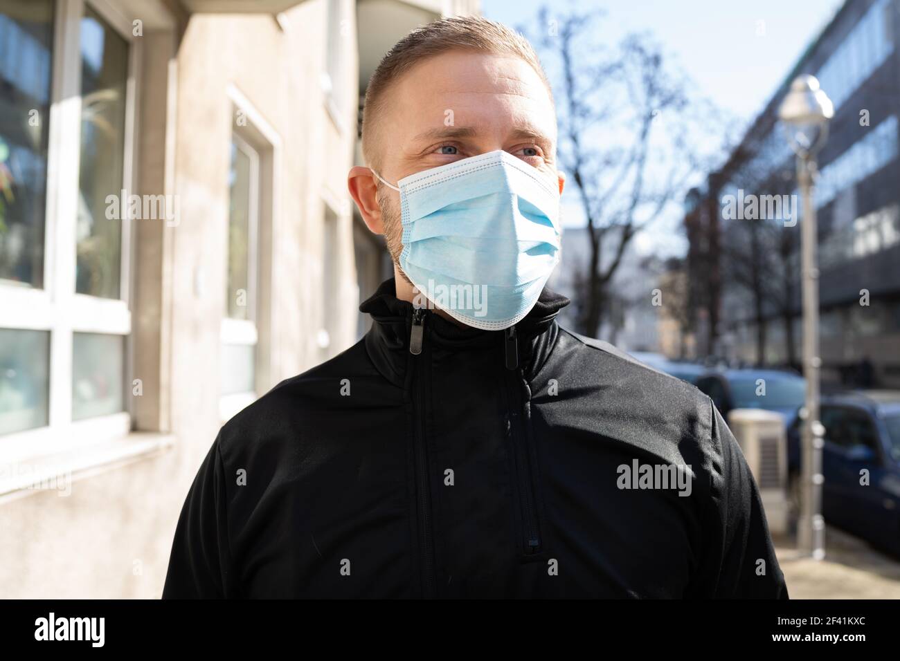 Portrait young man medical mask hi-res stock photography and images - Alamy