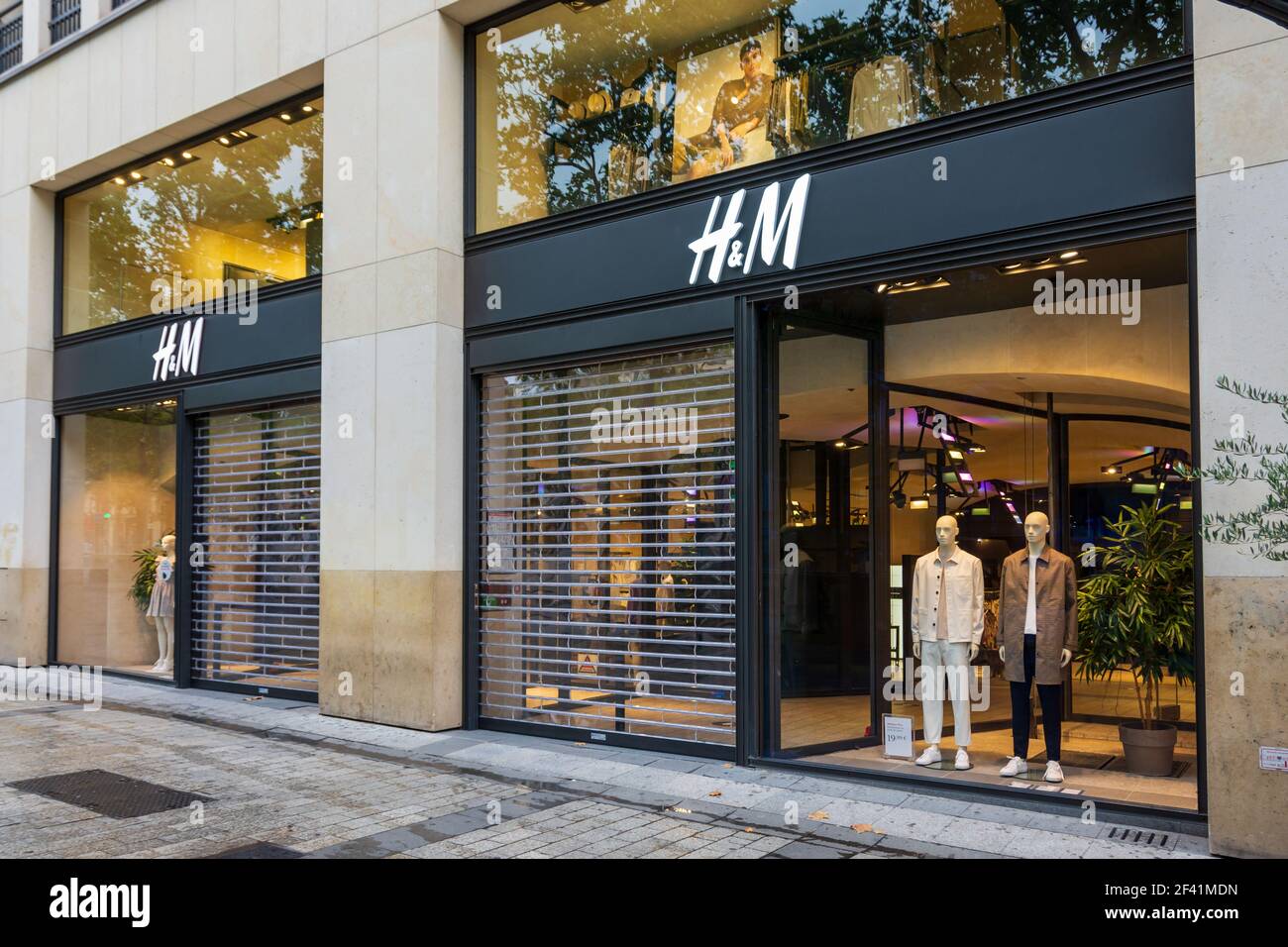 Facade of the H&M store on the avenue des Champs-Elysées, Paris, France ...