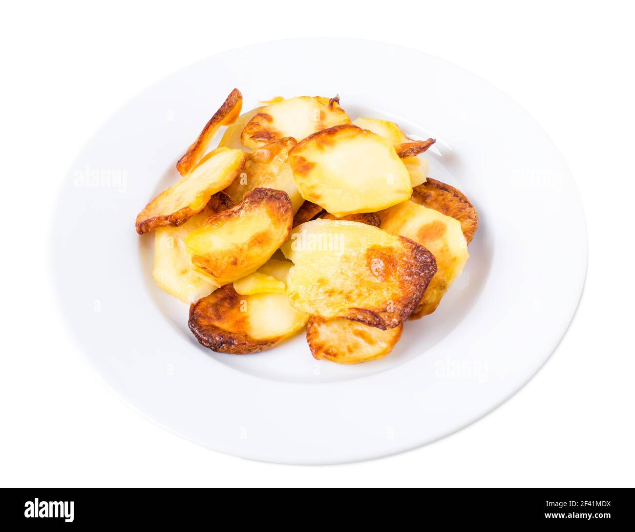 Traditional roast potatoes. Isolated on a white background Stock Photo ...