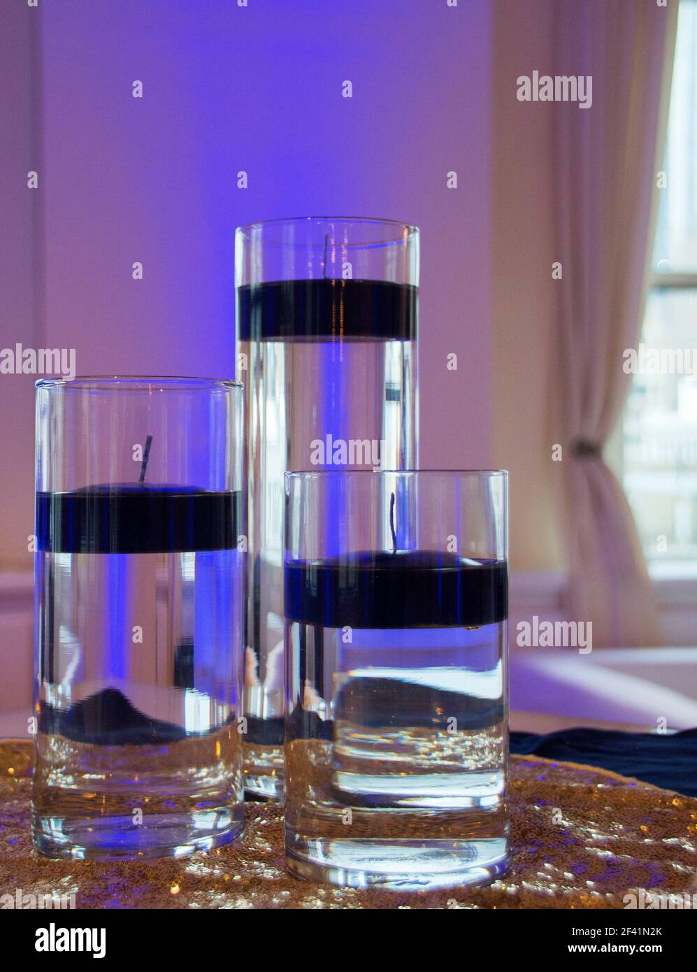 Glass bowls with floating candles Stock Photo Alamy