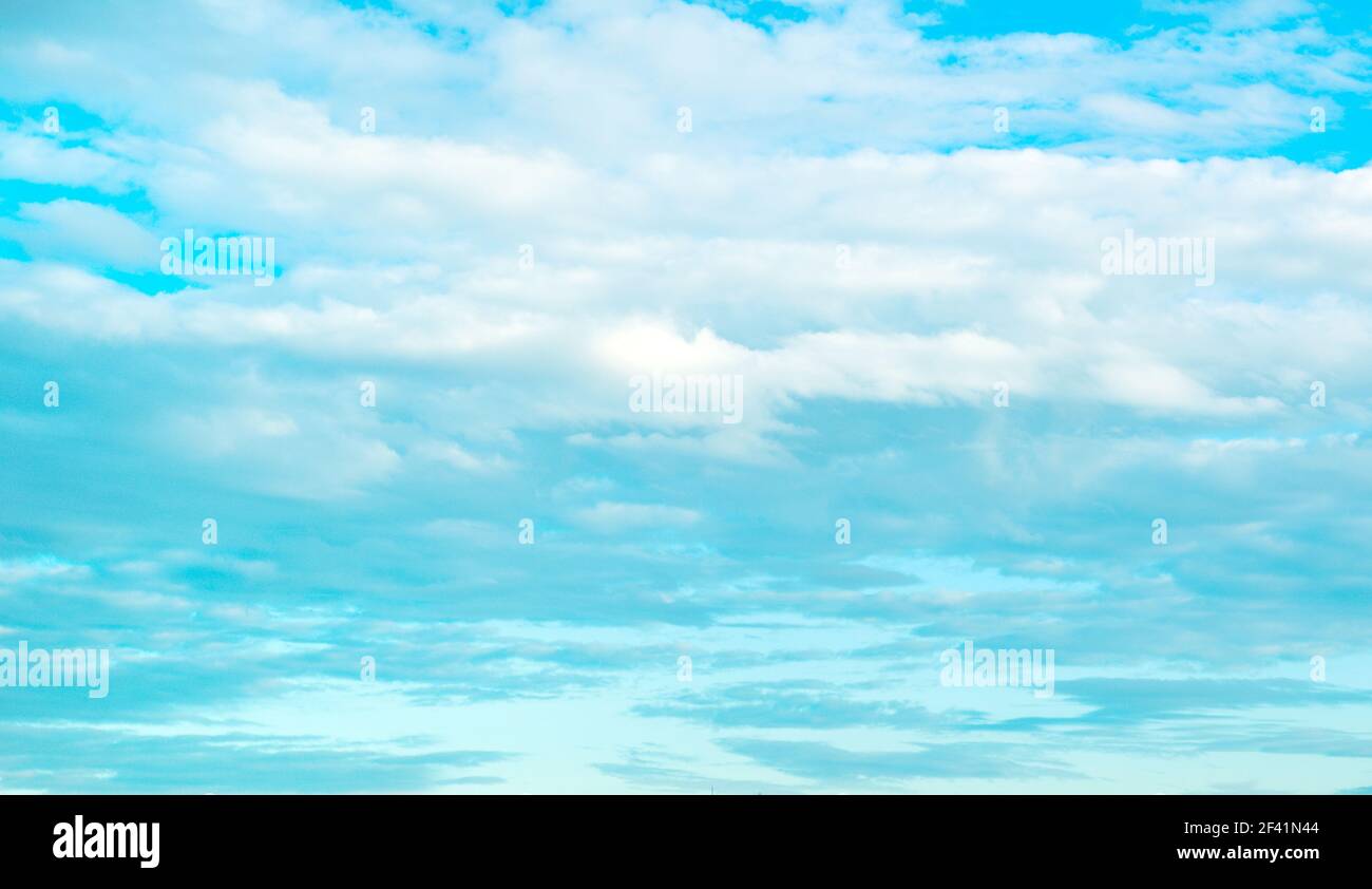 Beautiful blue sky with lots of fluffy clouds Stock Photo - Alamy