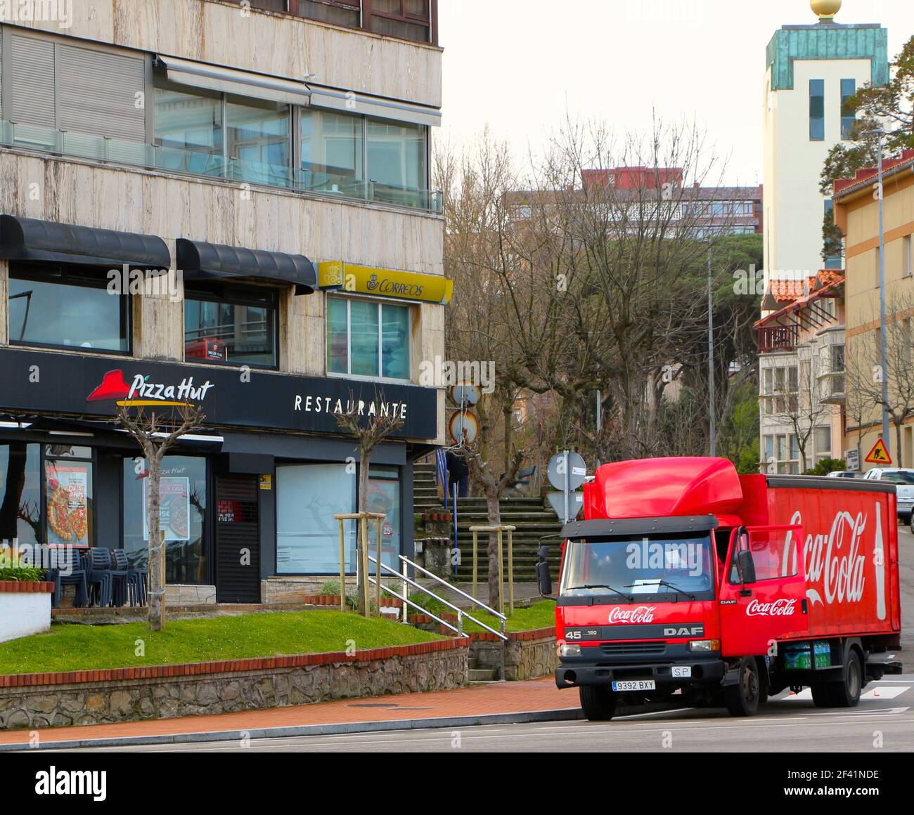 Parked Coca-Cola lorry outside a closed Pizza Hut restaurant Piquio  Santander Cantabria Spain Winter morning Stock Photo - Alamy