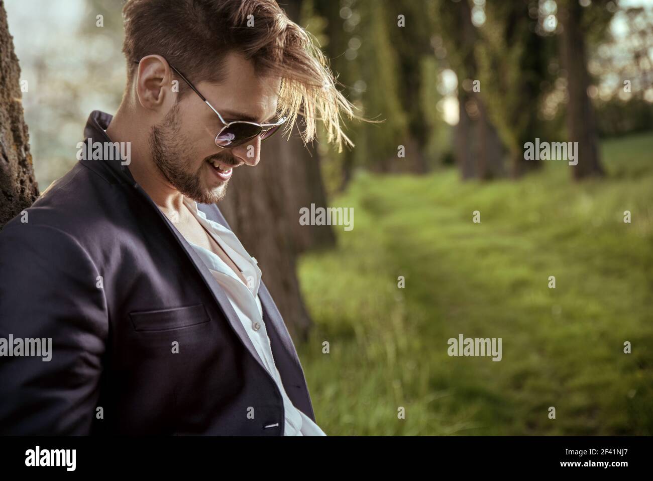 Handsome guy relaxing in the rural area Stock Photo