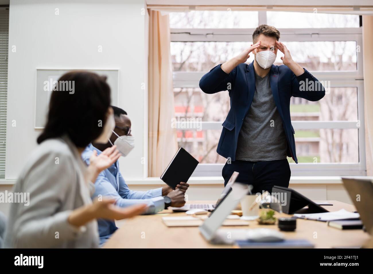 Bully Conflict And Argument. Talking And Fighting Wearing Mask Stock Photo