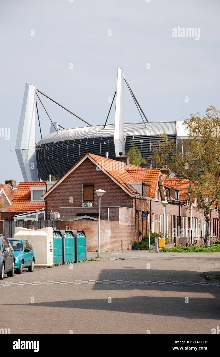 Eindhoven, Netherlands 04-11-2009 typical architecture small houses and philips sport stadium Stock Photo
