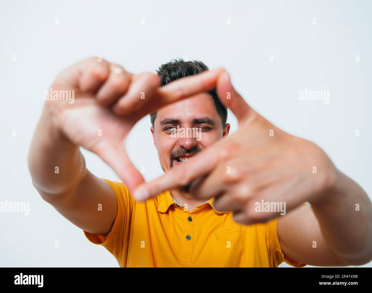 man making a hand frame Stock Photo Alamy