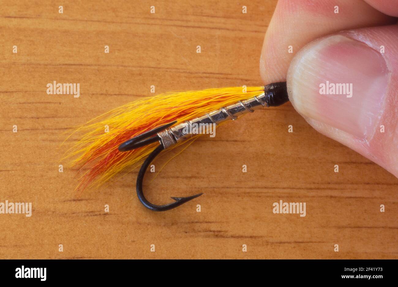 Hand holding lure hi-res stock photography and images - Alamy