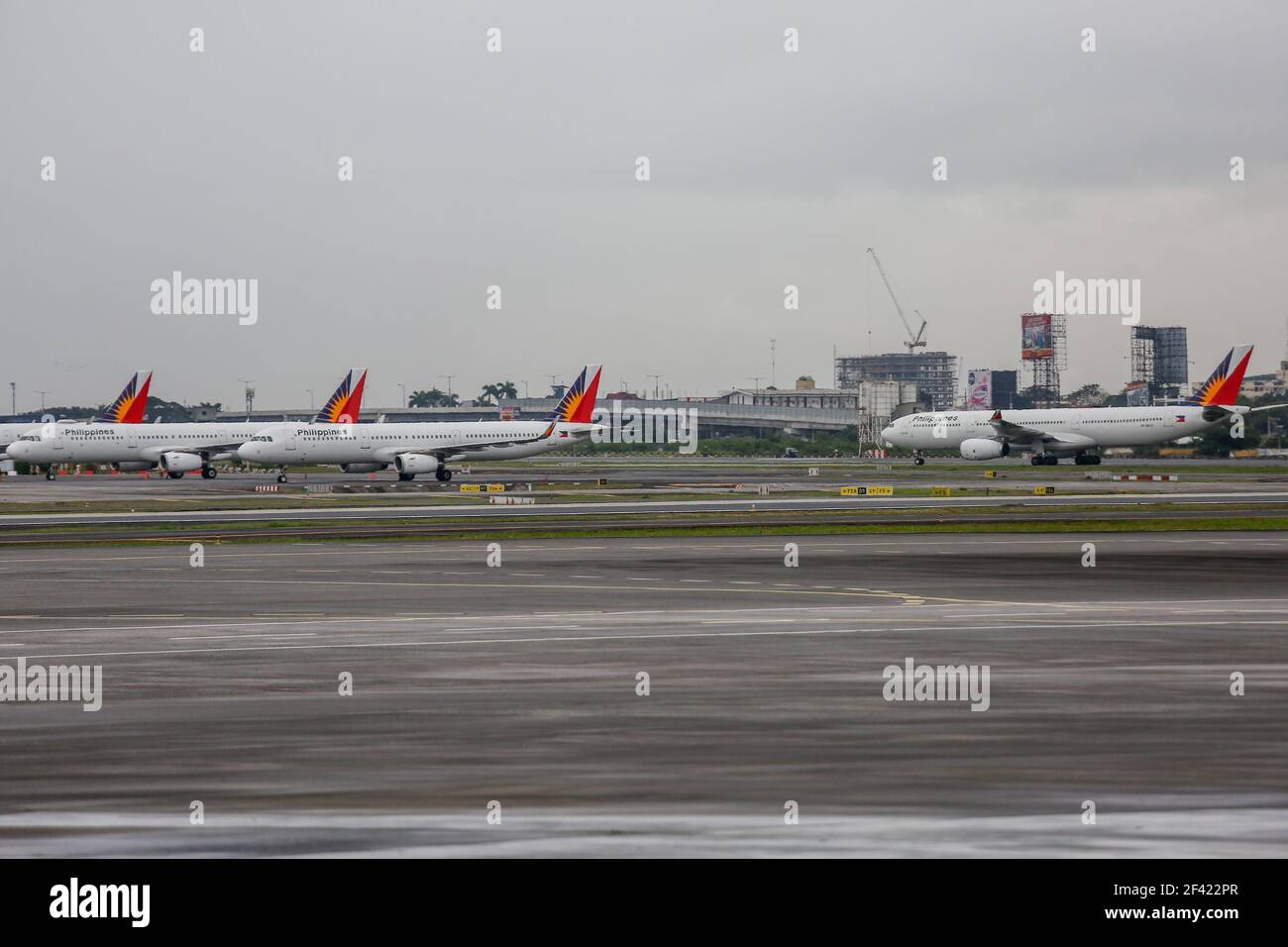 Philippine Airlines planes are seen parked on the tarmac of the Ninoy Aquino International Airport (NAIA) Terminal 2 in Pasay City, Metro Manila, Philippines. Stock Photo
