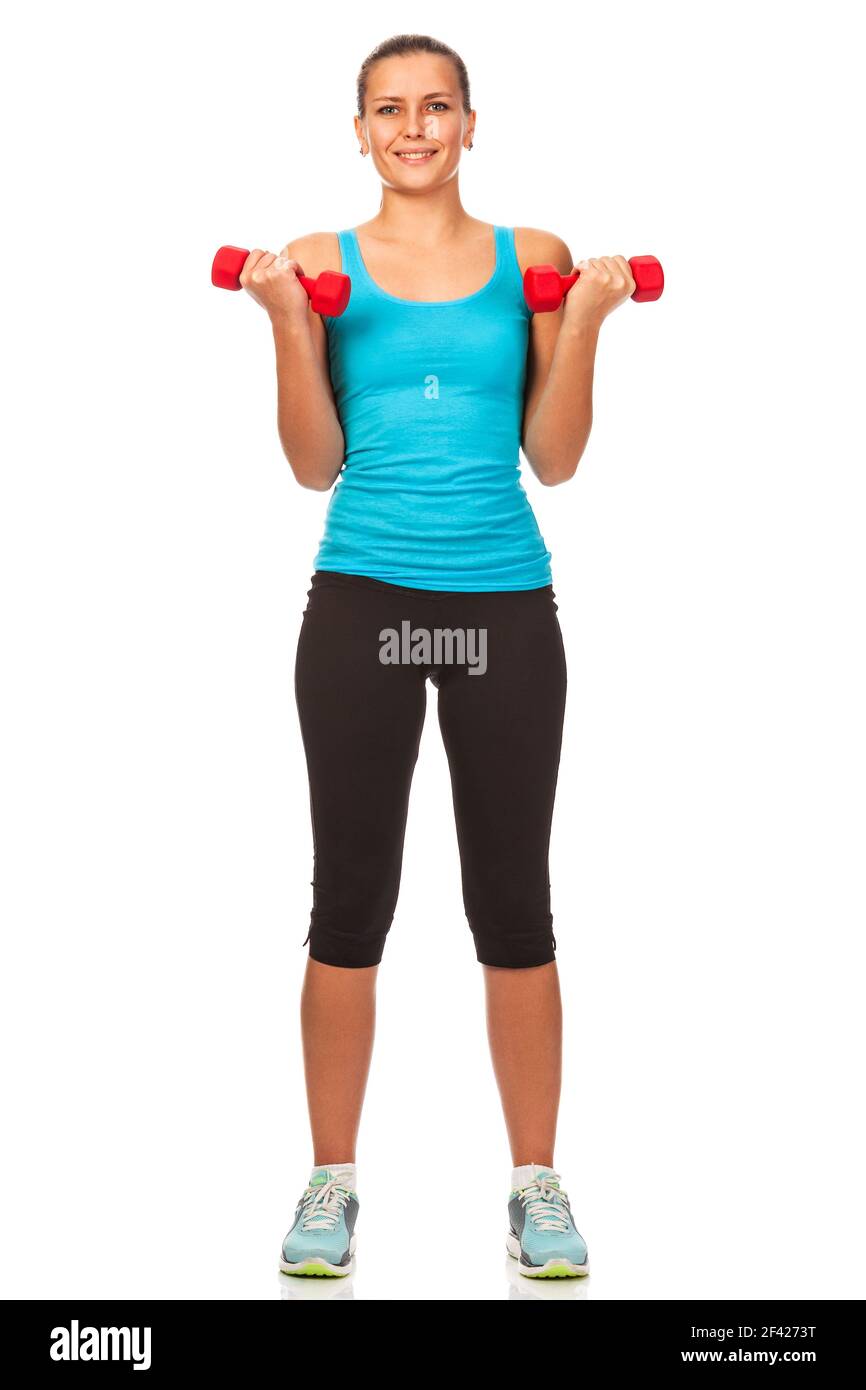 Healthy young woman exercising with red barbells, isolated on white background Stock Photo