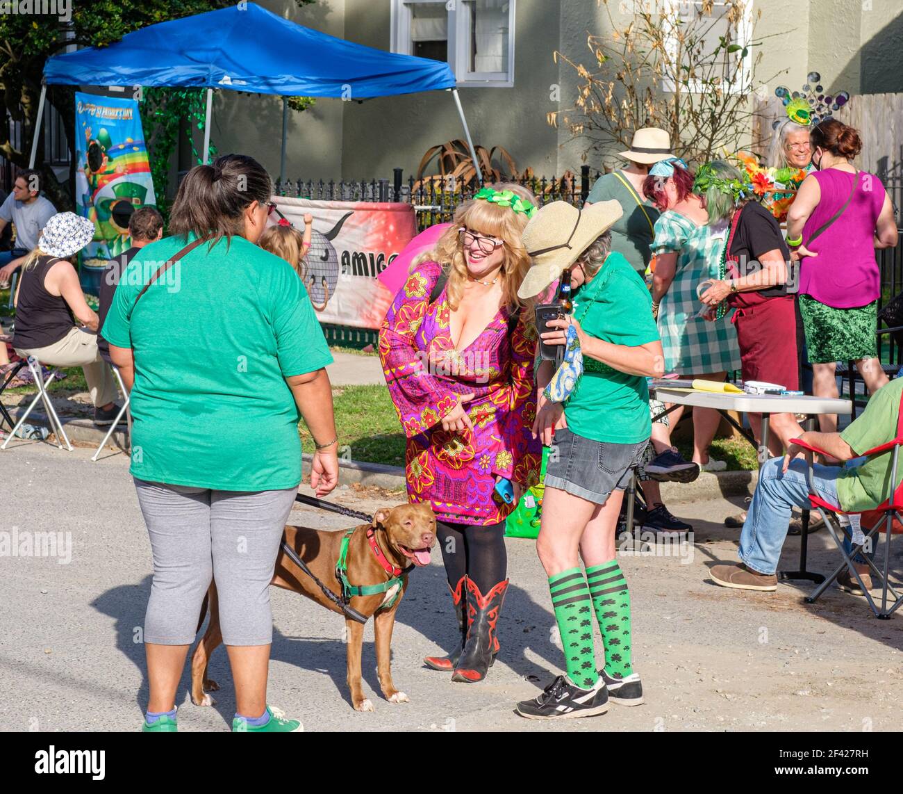 NEW ORLEANS, LA, USA - MARCH 13, 2021: Uptown neighborhood celebrating St. Patrick's day with block party Stock Photo