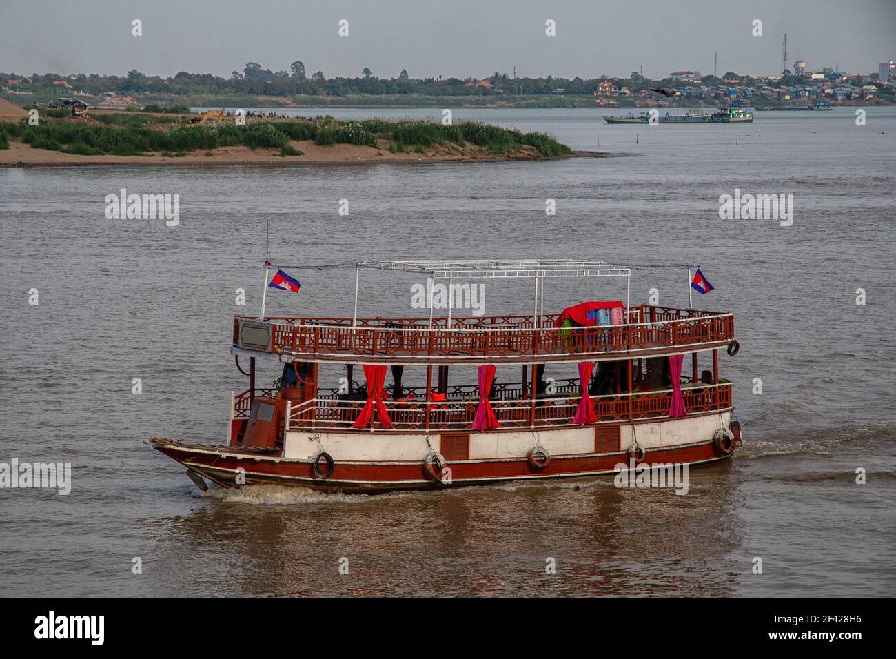 Traditional ship on the Tonle Sap River in Phnom Penh Stock Photo