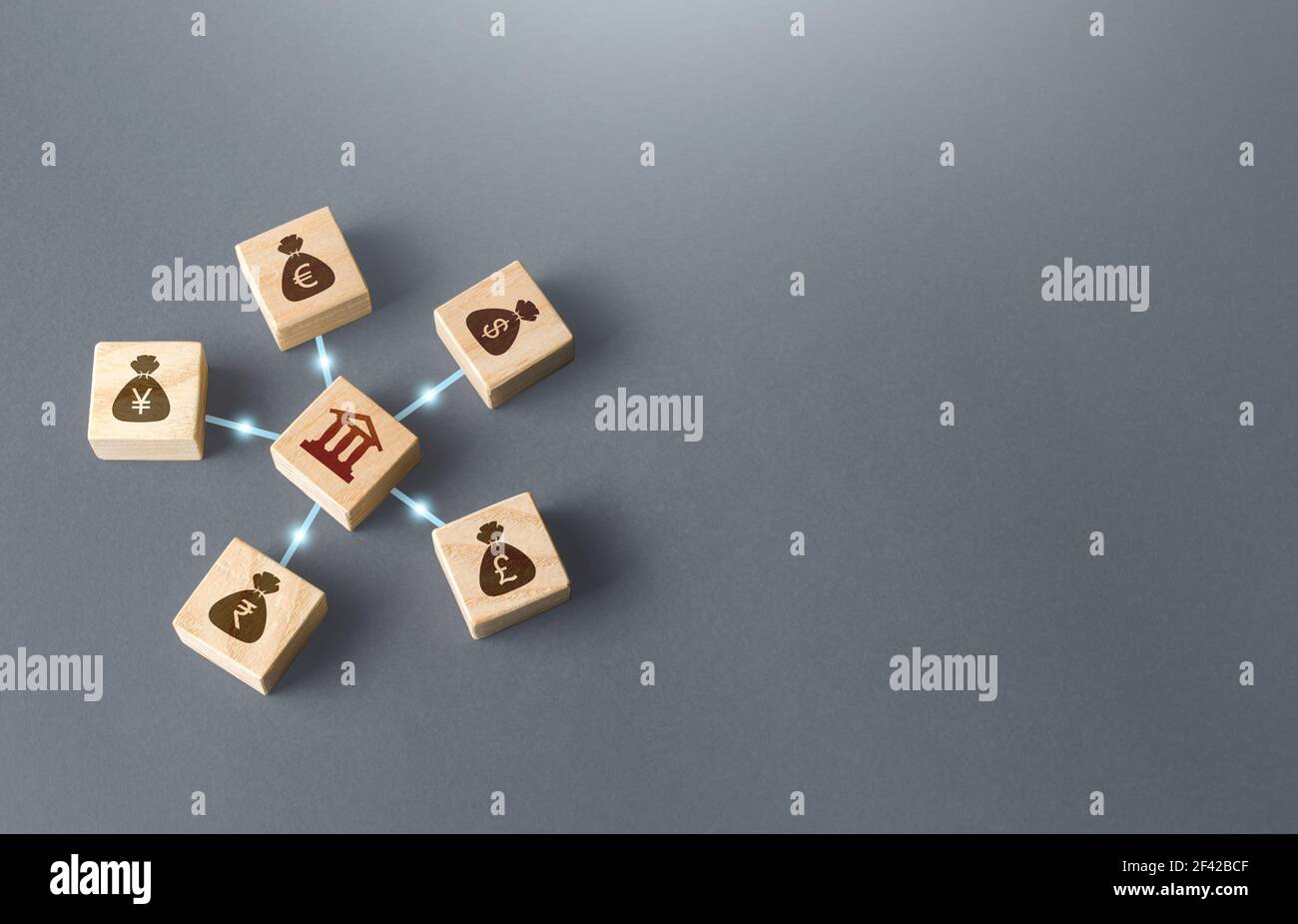 Linked blocks bank and world currencies money bags. Financial system, concept of national reserve system. Attraction of credit resources in internatio Stock Photo