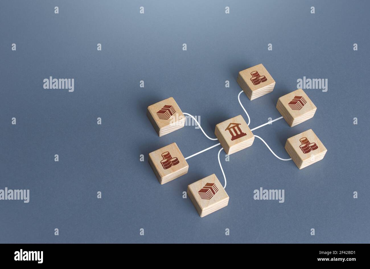 Bank blocks are linked to money by lines. Operation of money funds, transactions. Lending, deposits. Capital Markets. Investment. Borrowing. Capitaliz Stock Photo
