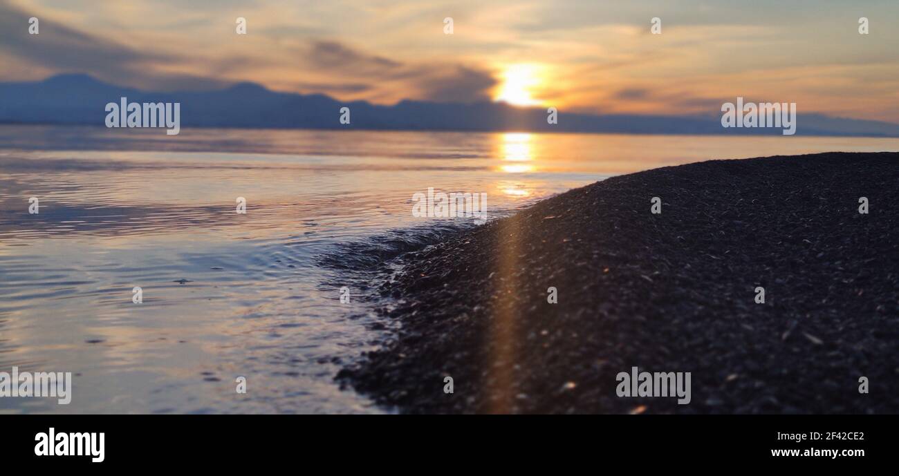 A beautiful sunset over the lake Sevan in Armenia Stock Photo