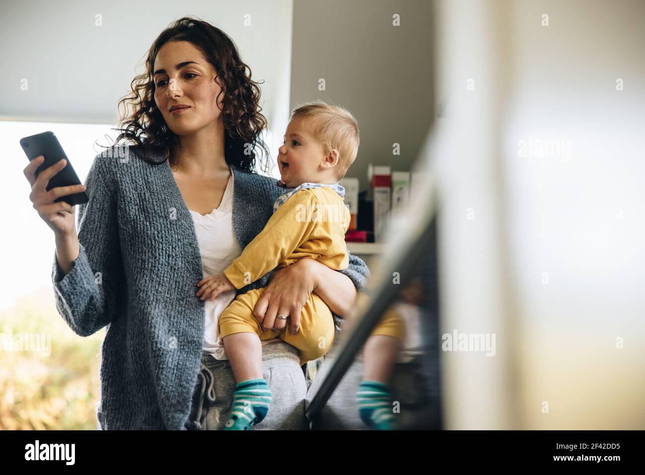 Woman holding her new born hi-res stock photography and images - Alamy