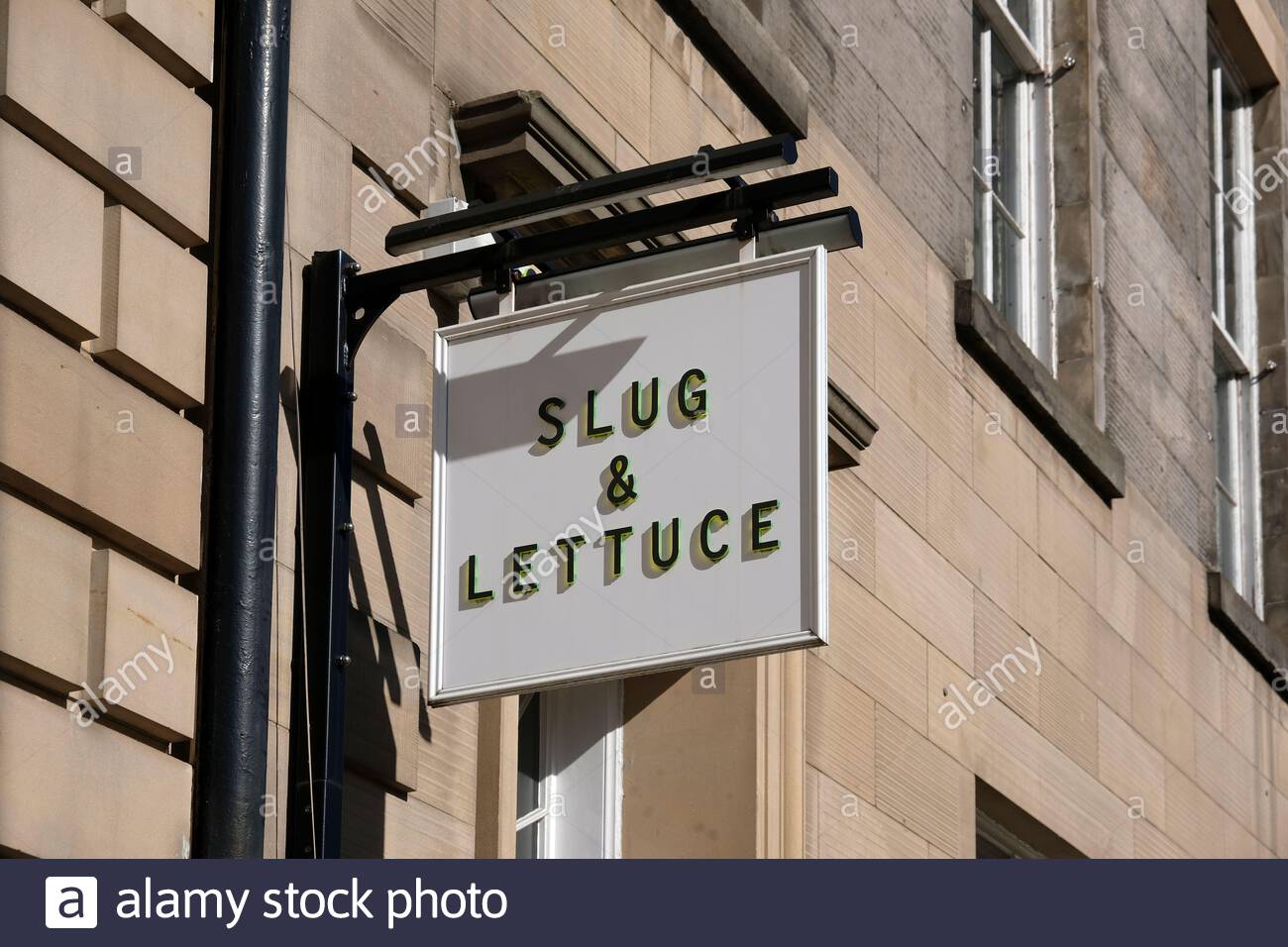 Slug & Lettuce bar sign, George Street, Edinburgh, Scotland Stock Photo