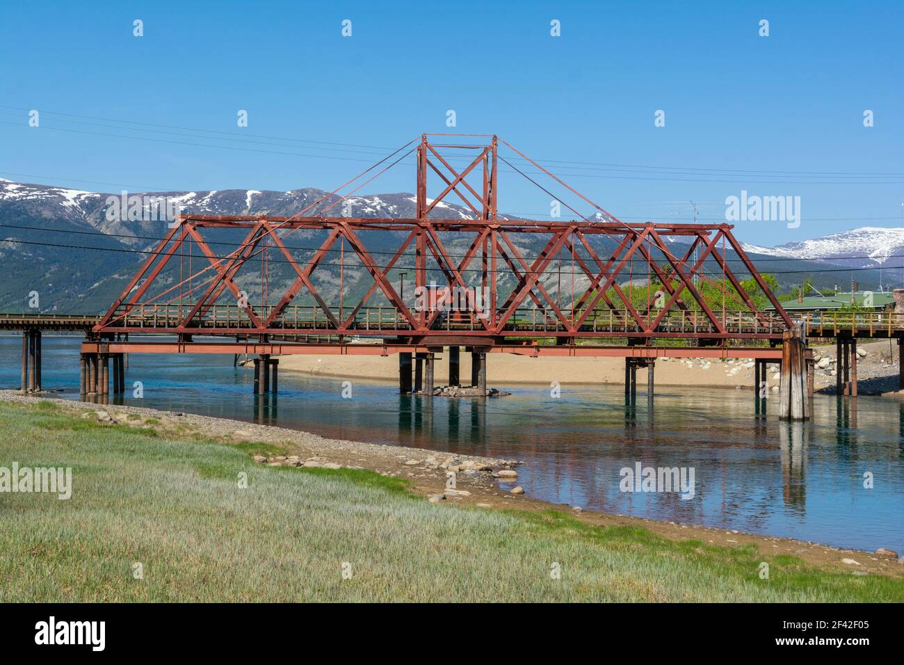 Canada, Yukon, Carcross, swing bridge across the Nares River built 1900, still used by White Pass & Yukon Route tourist train Stock Photo