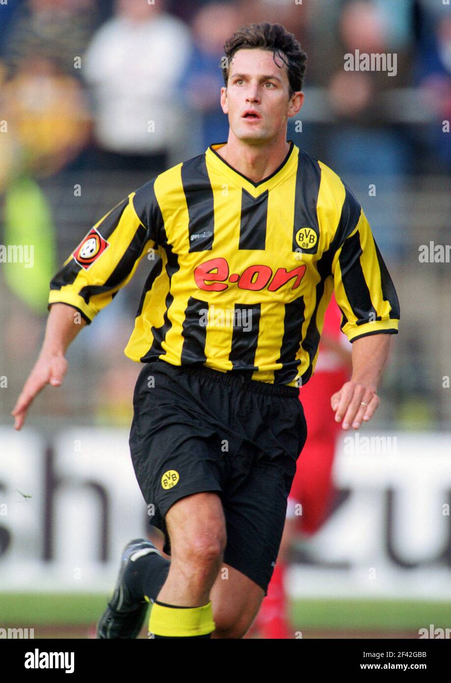 Dortmund, Germany 18.7.2000, Football:  Bundesliga season 2000/01,  pre-season test match Borussia Dortmund (BVB, yellow) - Heiko HERRLICH Stock Photo
