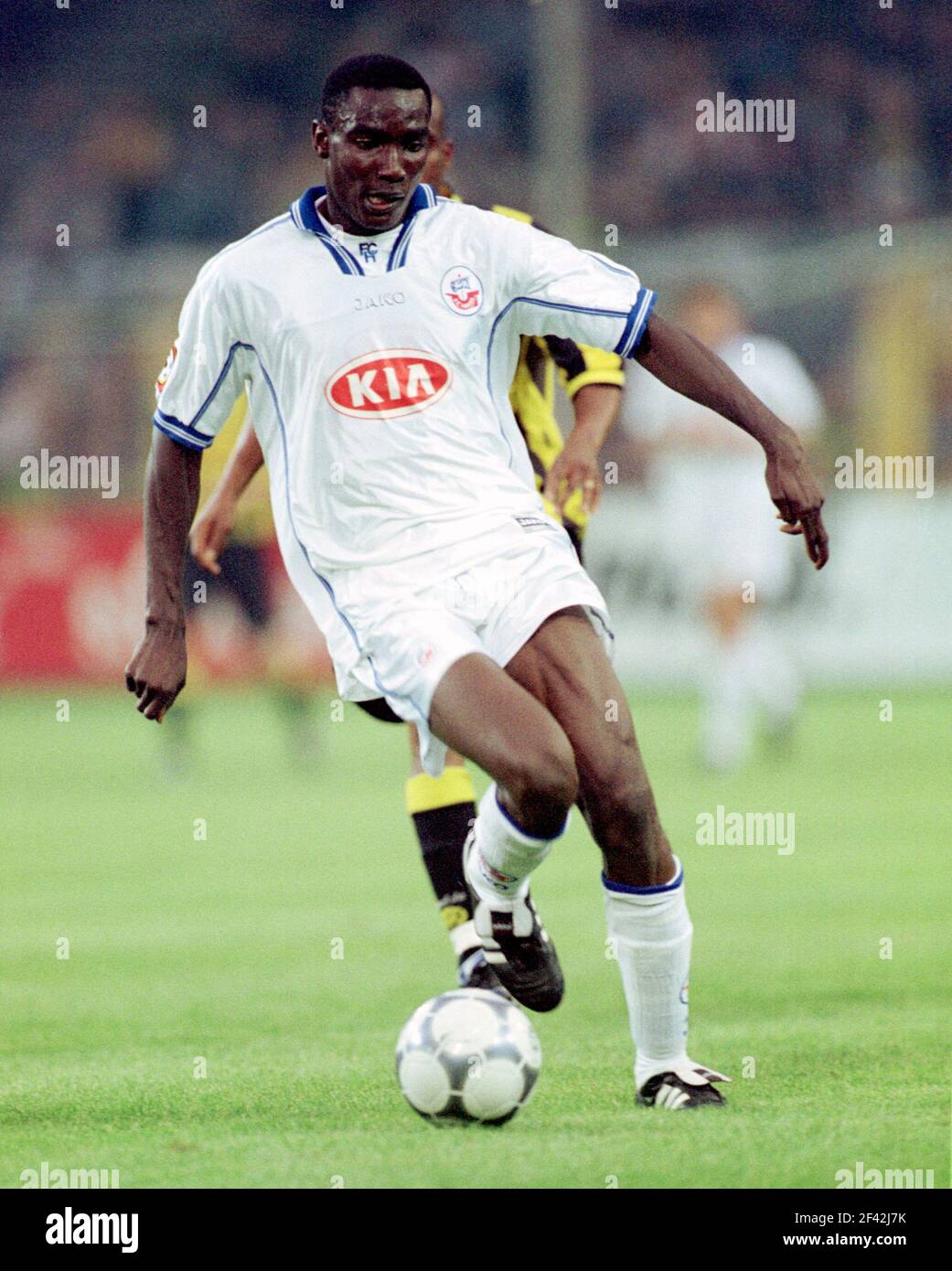 Dortmund, Germany 11.8. 2000, Football:  Bundesliga season 2000/01,  Borussia Dortmund (BVB, yellow) vs Hansa Rostock (HRO, white) 1:0 - Victor AGALI  (HRO) Stock Photo