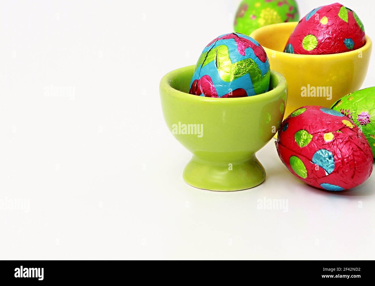 chocolate Easter eggs displayed in many colours stock photo Stock Photo