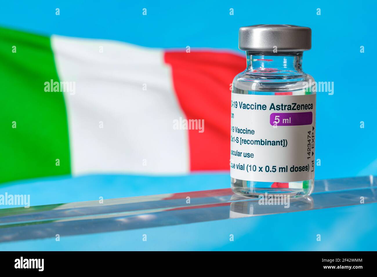Montreal, CA - 18 March 2021: Vial of Astrazeneca Covid-19 vaccine in front of an Italy flag Stock Photo