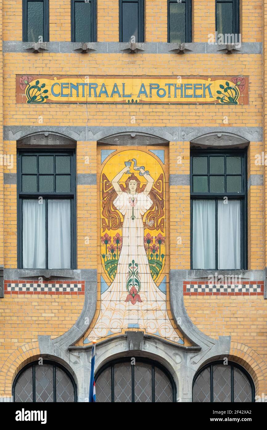 Hygieia - greek goddess of health - tile tableau on the art Nouveau style Central Pharmacy building - Leeuwarden, Friesland, Netherlands Stock Photo