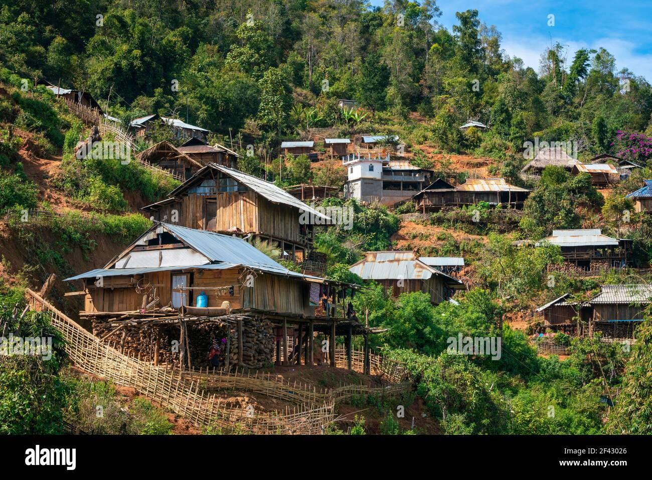 Houses in remote village of Eng tribe in mountains near Kengtung, Myanmar Stock Photo