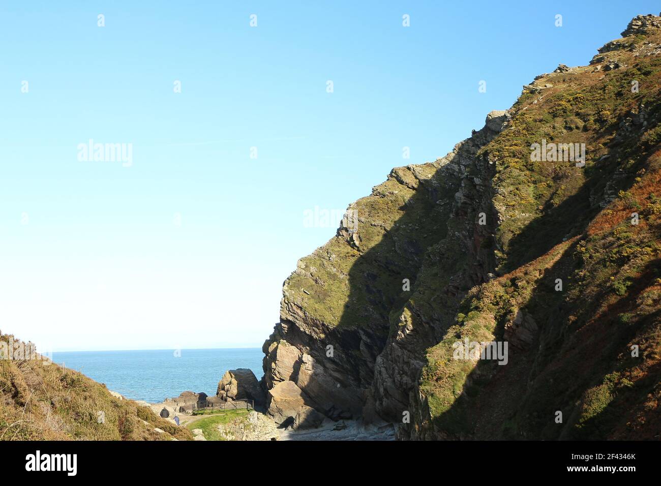 The national trust site of Heddon valley in it's full glory with the river gushing out to sea at Heddons mouth in North Devon, south west England foll Stock Photo