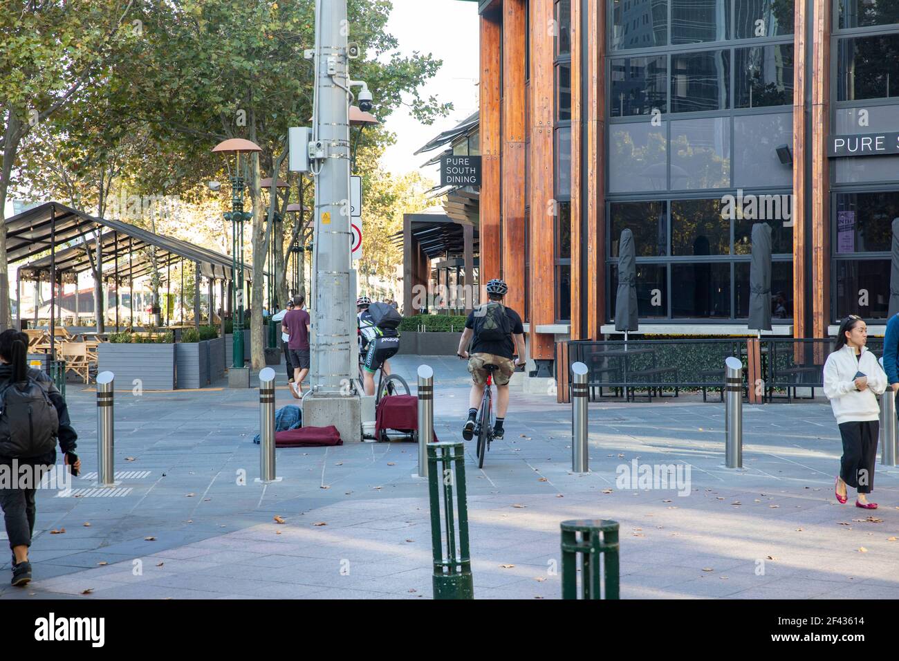 Melbourne southbank cyclists commuting in the pedestrianised area, Melbourne city centre,Victoria,Australia Stock Photo