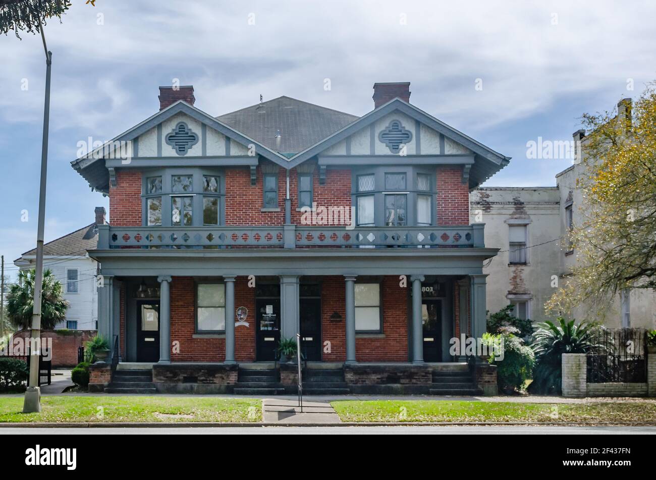 A historic house stands on Government Street in the Oakleigh Garden Historic District, March 13, 2021, in Mobile, Alabama. Stock Photo