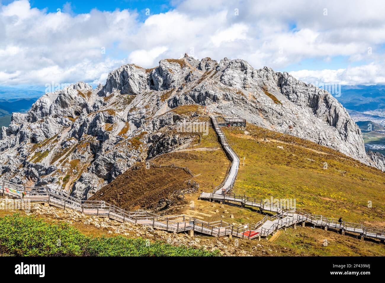 Shika snow mountain summit view in autumn with yellow color grass