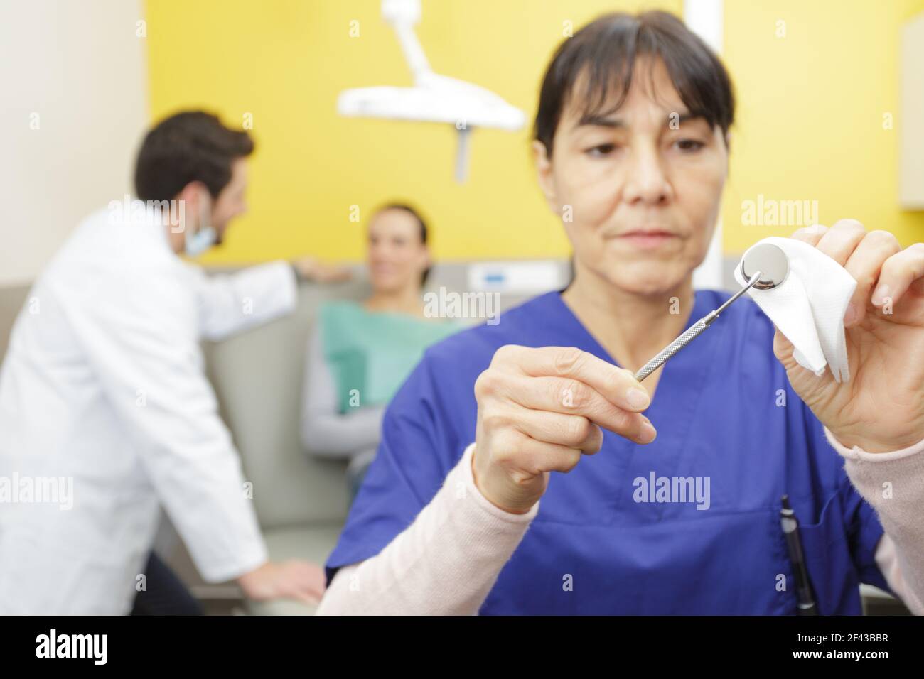 female medical worker preparing for surgery Stock Photo