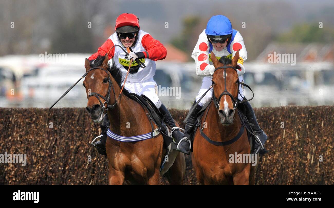 RACING AT AINTREE. 8/4/2010. THE TOTESPORT BOWL CHASE. WINNER RUBY WALSH ON WHAT A FRIEND AT THE LAST (RIGHT). PICTURE DAVID ASHDOWN Stock Photo