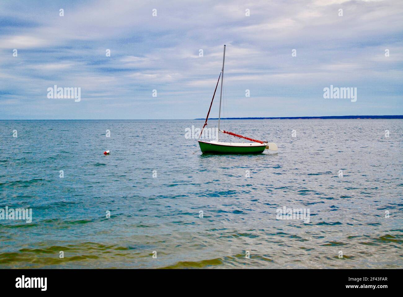 Portrait of a Lone Sailboat on the Water, Gardiners Bay in East Hampton ...