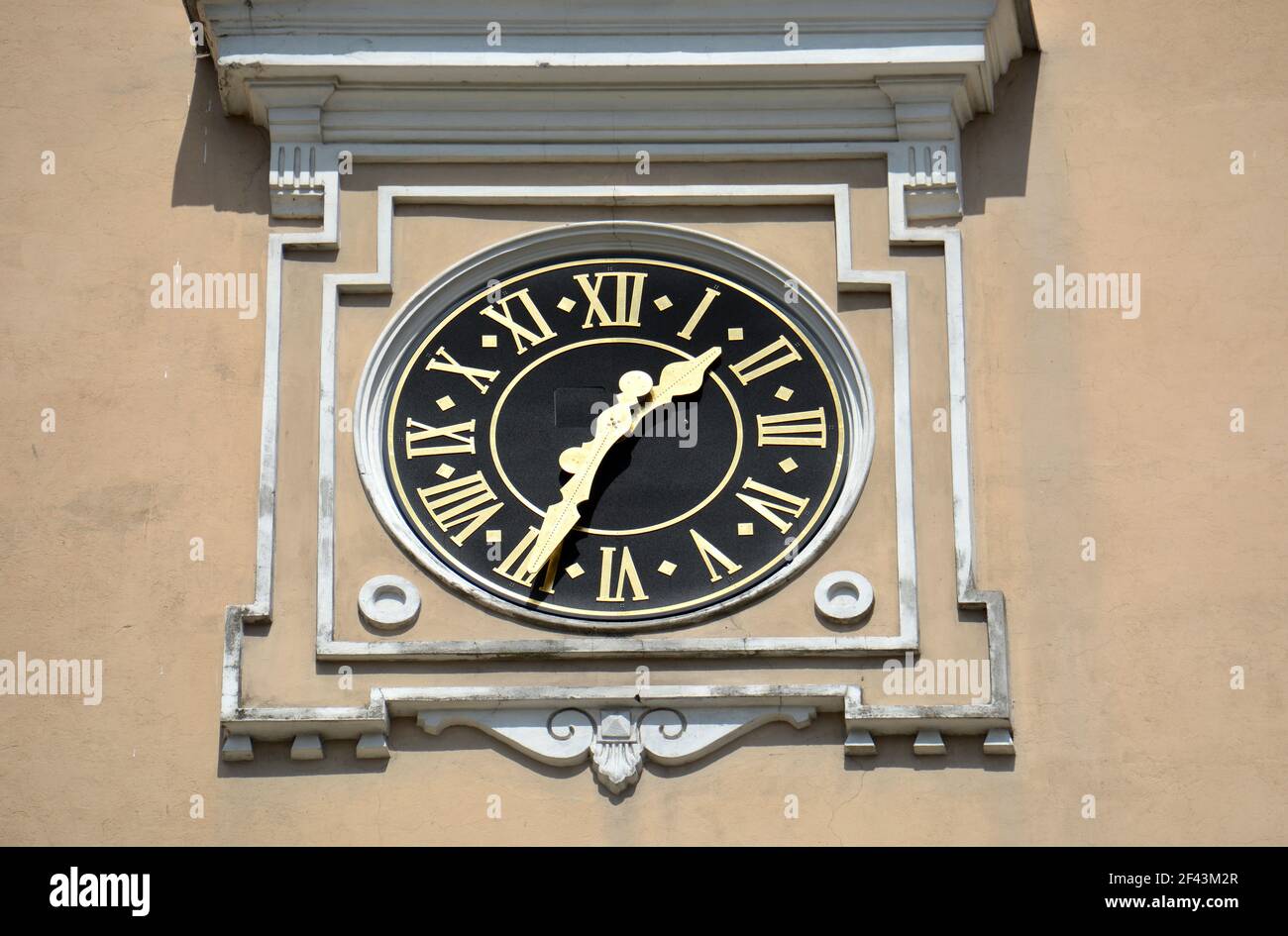 Clock on historical church bell tower wall, Lithuania Stock Photo