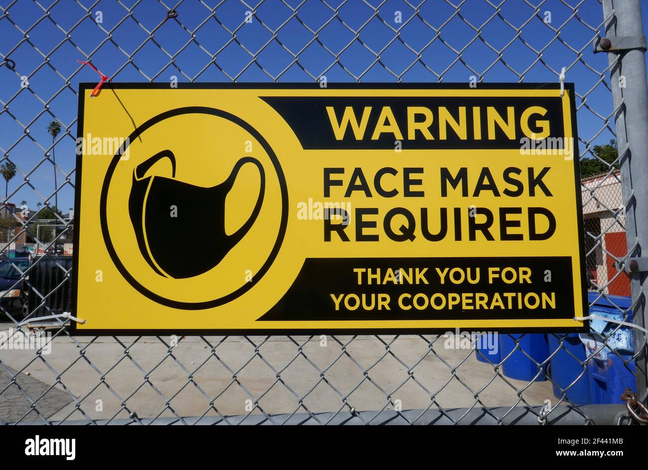 Los Angeles, California, USA 18th March 2021 A general view of atmosphere of Warning Face Mask Required Sign in Los Angeles, California, USA. Photo by Barry King/Alamy Stock Photo Stock Photo