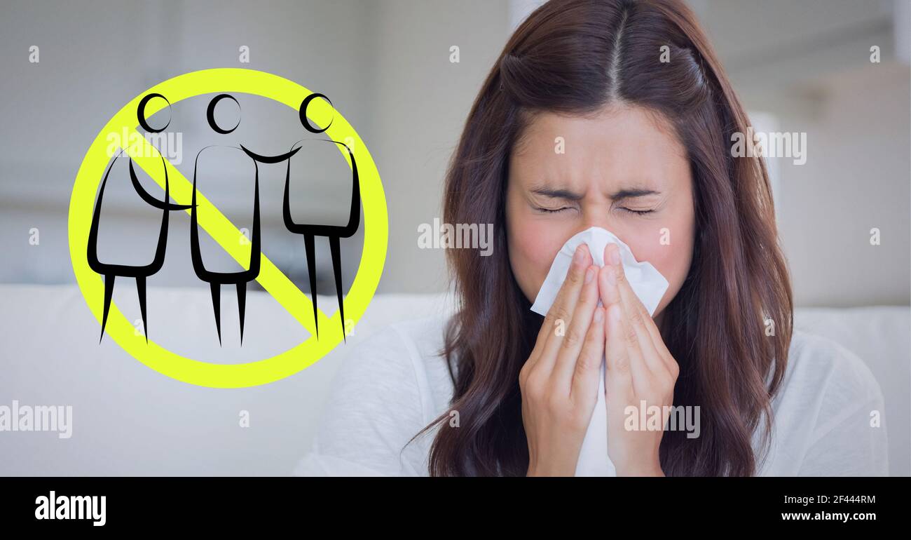 Illustration of social distancing sign over sick woman blowing nose in background Stock Photo