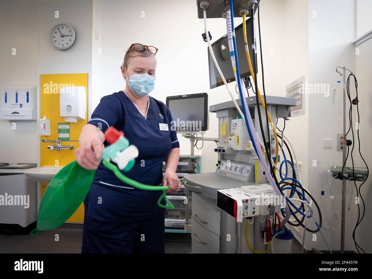Charge nurse Katy Currie sets up equipment in the Resuscitation Room in