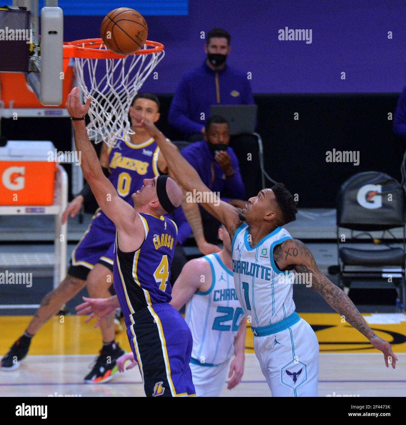 Los Angeles, United States. 18th Mar, 2021. Los Angeles Lakers' guard Alex Caruso scores Charlotte Hornets' guard Malik Monk during the first half at Staples Center in Los Angeles on Thursday, March 18, 2021. The Lakers defeated the Hornets 116-105. Photo by Jim Ruymen/UPI Credit: UPI/Alamy Live News Credit: UPI/Alamy Live News Stock Photo