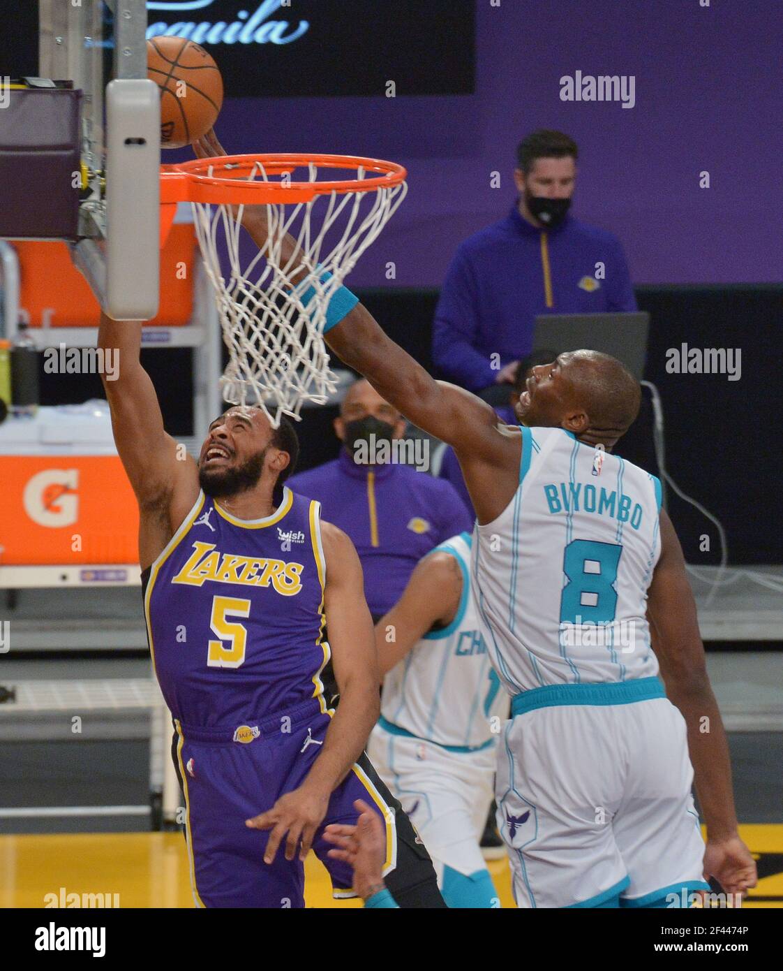 Los Angeles, United States. 18th Mar, 2021. Los Angeles Lakers' guard Talen Horton-Tucker scores on Charlotte Hornets' guard Malik Monk during the first half at Staples Center in Los Angeles on Thursday, March 18, 2021. The Lakers defeated the Hornets 116-105. Photo by Jim Ruymen/UPI Credit: UPI/Alamy Live News Credit: UPI/Alamy Live News Stock Photo