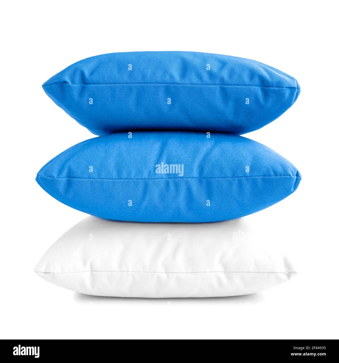 Stack of three cushions or pillows isolated on white background Stock Photo
