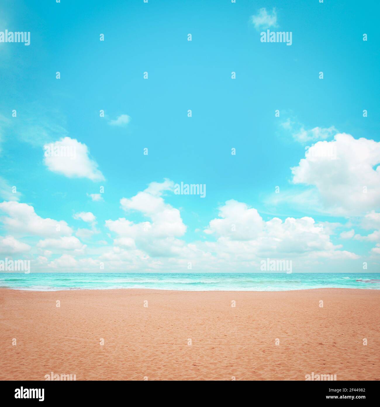 Sand beach with blue sky background Stock Photo Alamy
