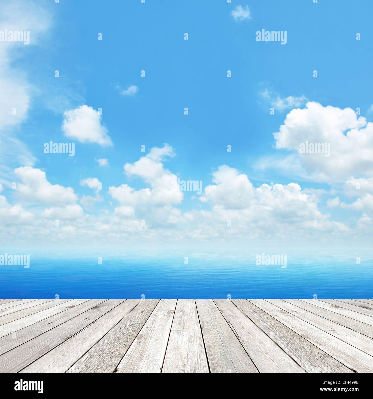 Wood plank as a pier on blue sky background Stock Photo