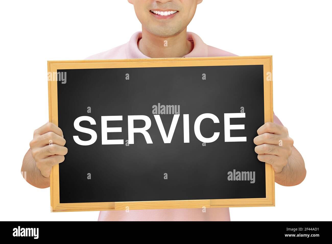 SERVICE sign on blackboard held by smiling man Stock Photo Alamy